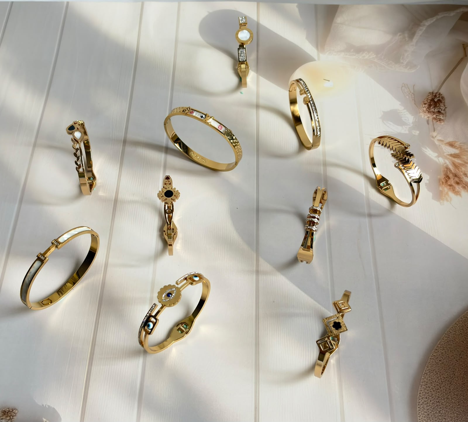 Signature gold bracelet and bangle collection